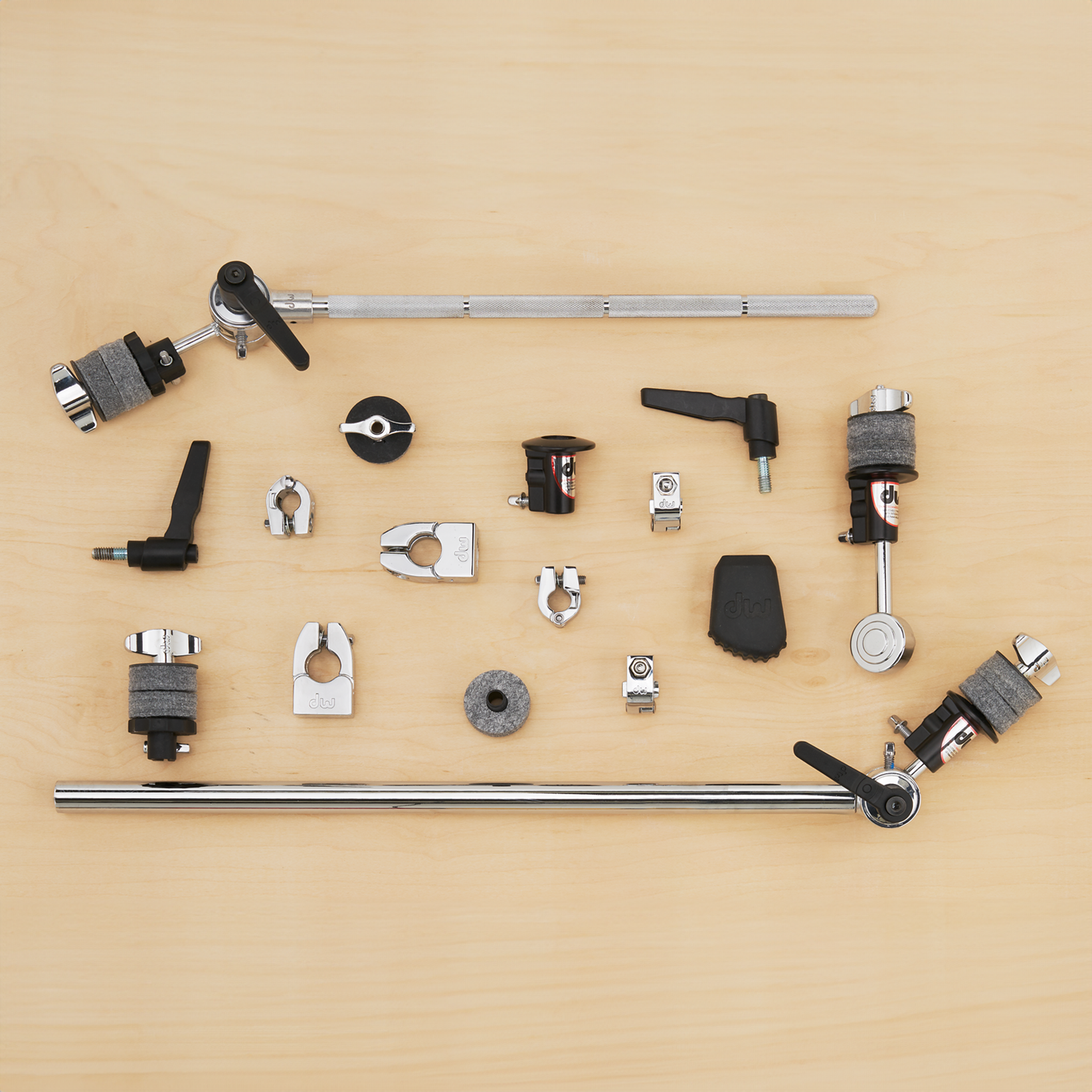 This collection of DW cymbal stand parts includes toothless tilters, tubing, memory locks, felts, replacement feet, and more.