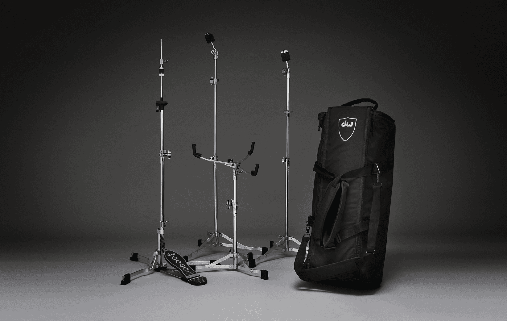 A complete low-profile DW 6000 hardware pack with hi-hat, snare, and straight cymbal stands.