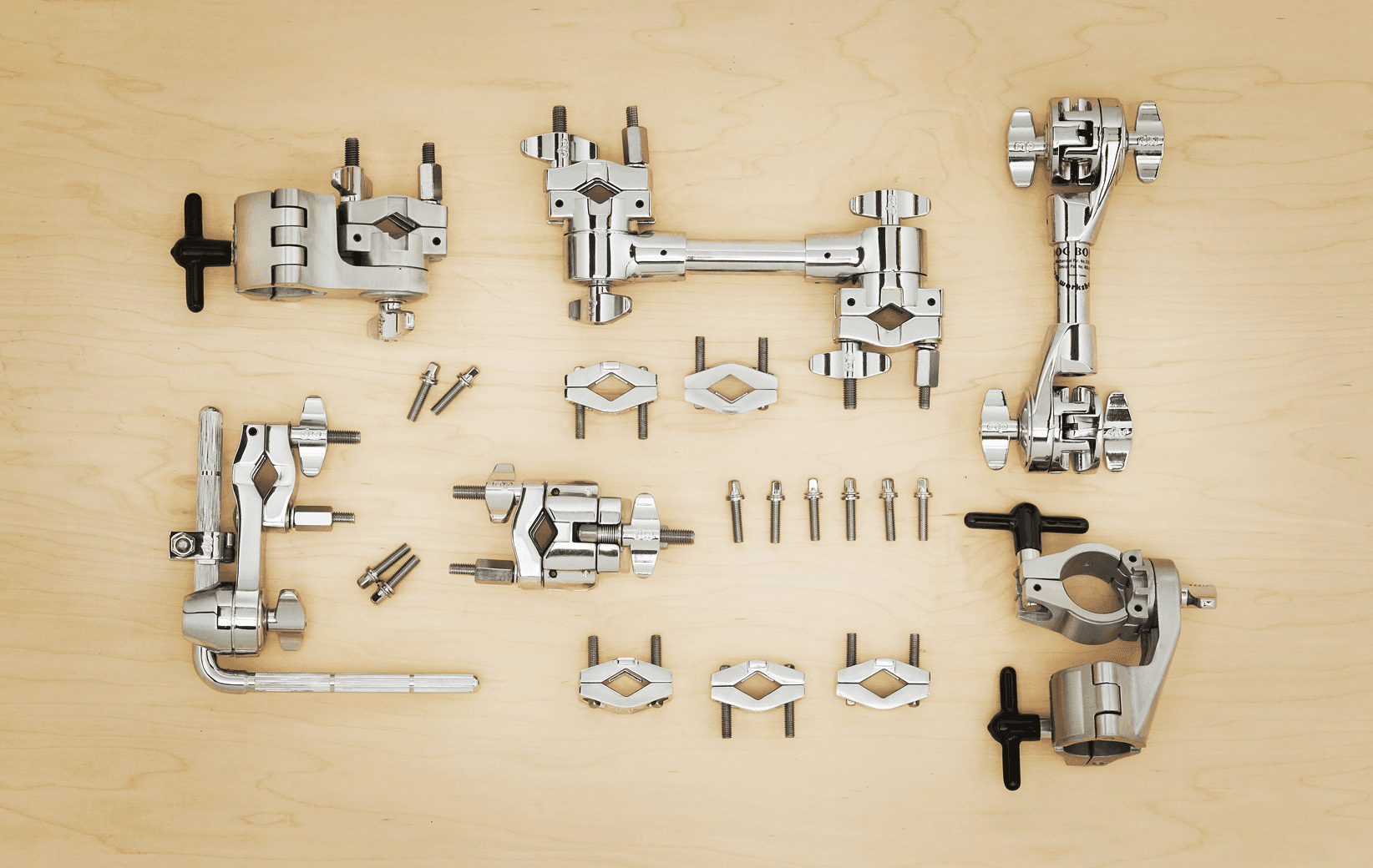 This spread of clamps includes dogbones, memory locks, accessory arms, and various replacement parts. 