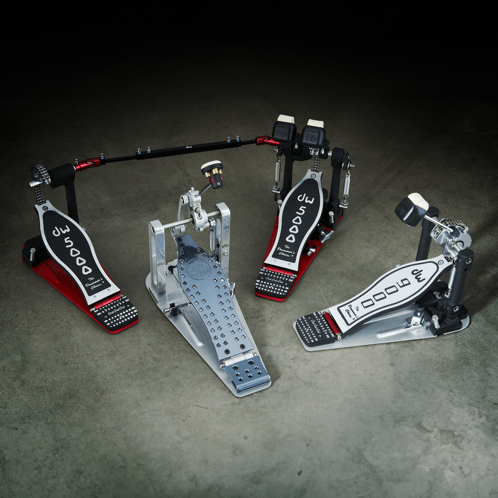 A DW MFG Series pedal, 9000 Series single pedal, and a 5000 Series double pedal.