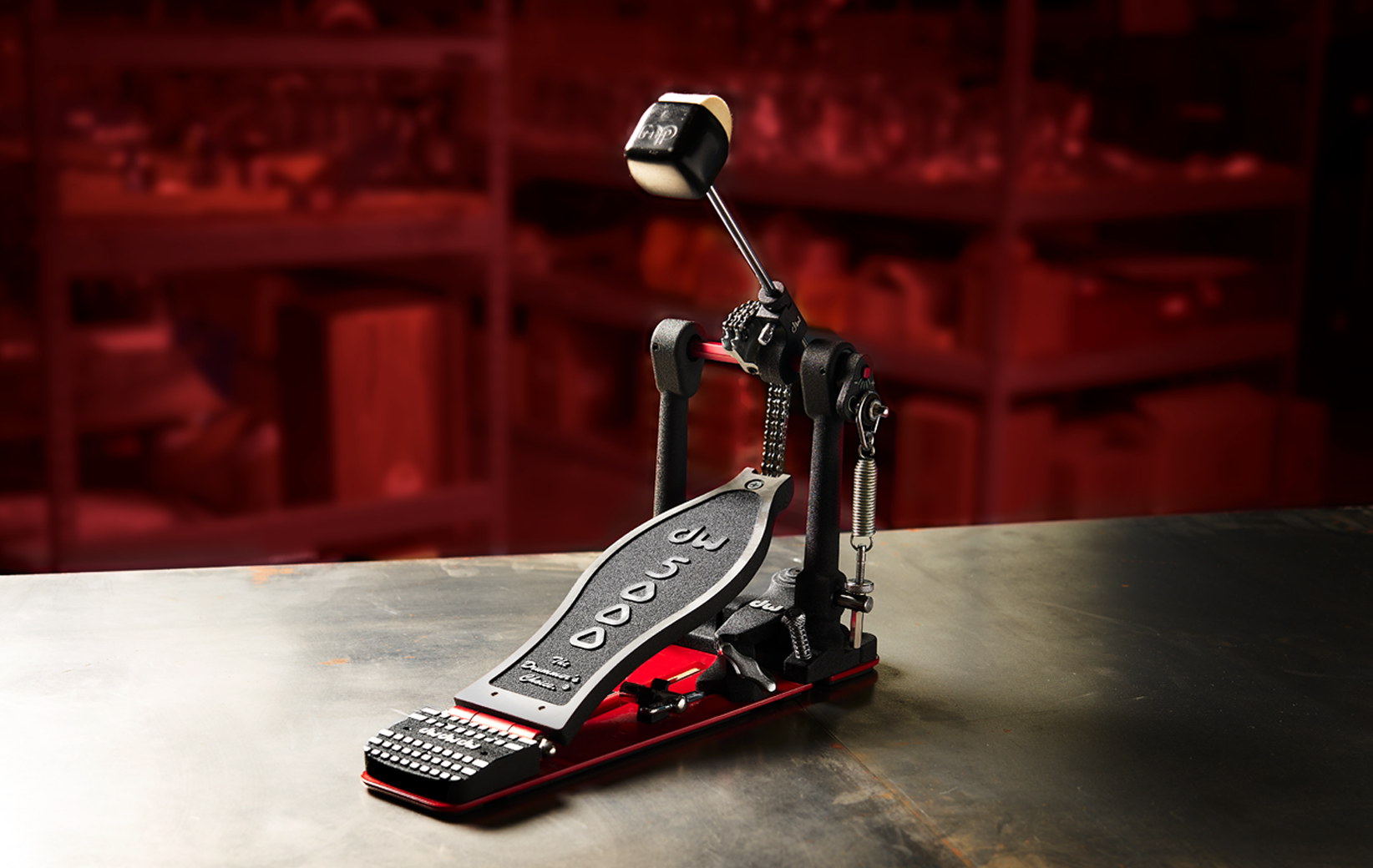 A classic DW 5000 Series single pedal with a dual-chain cam and steel baseplate. 