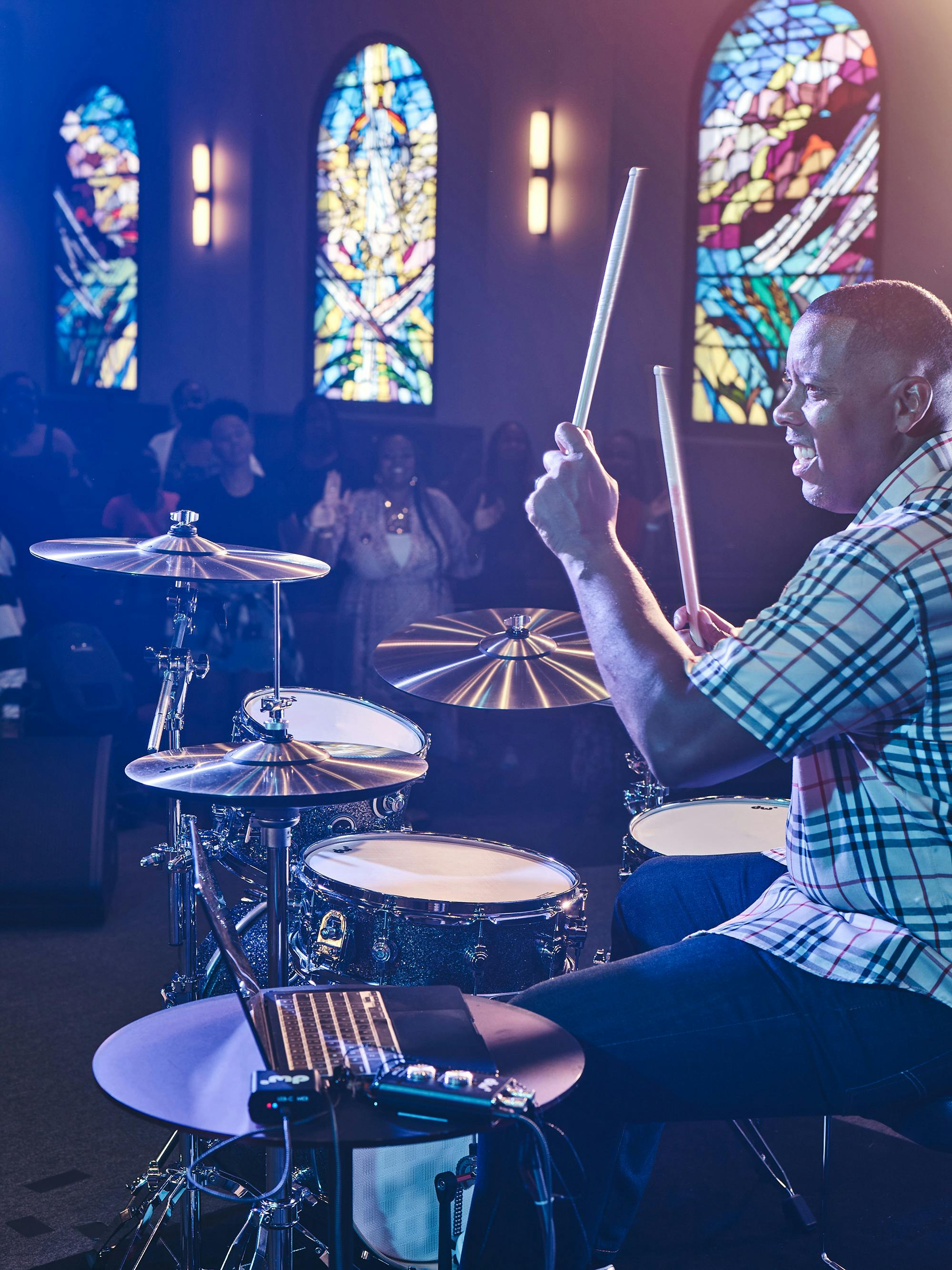 Drummer Nisan Stewart playing DWe Drums in a house of worship