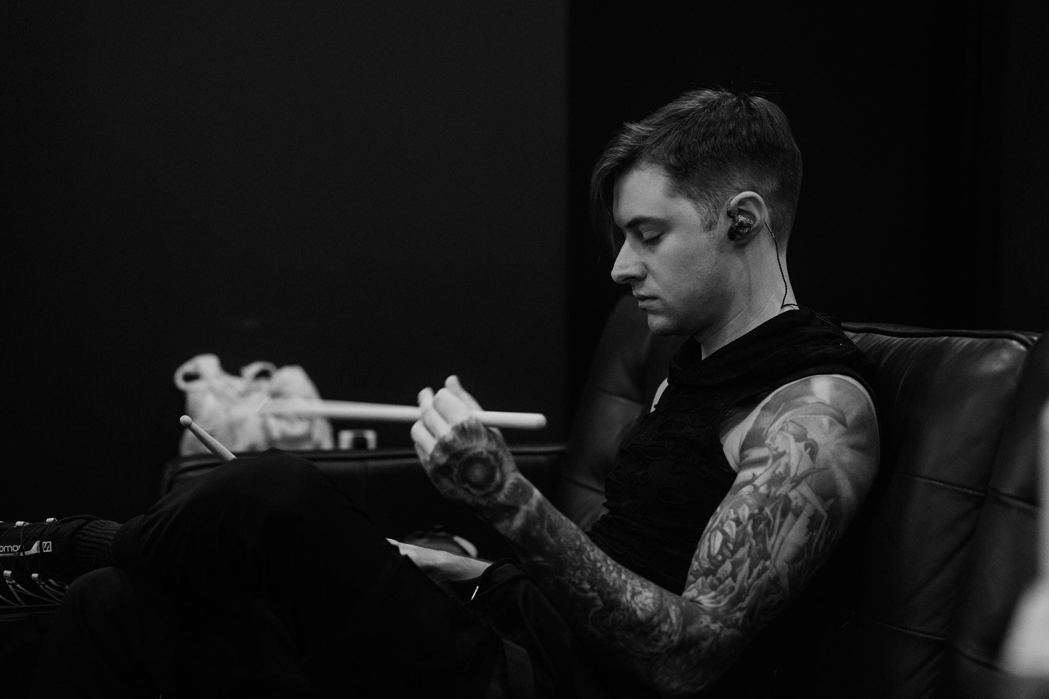 DW Artist Luke Holland warms up on practice pad backstage